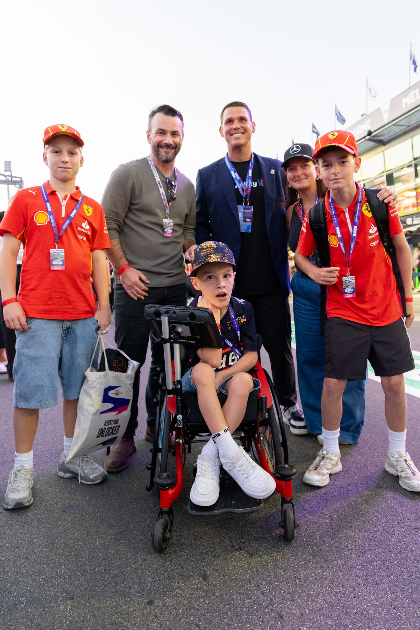A What Ability family enjoying a Formula 1 experience together