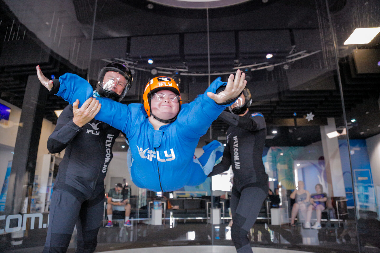 A group of What Ability Foundation participants, staff and volunteers together at an iFly All Abilities day